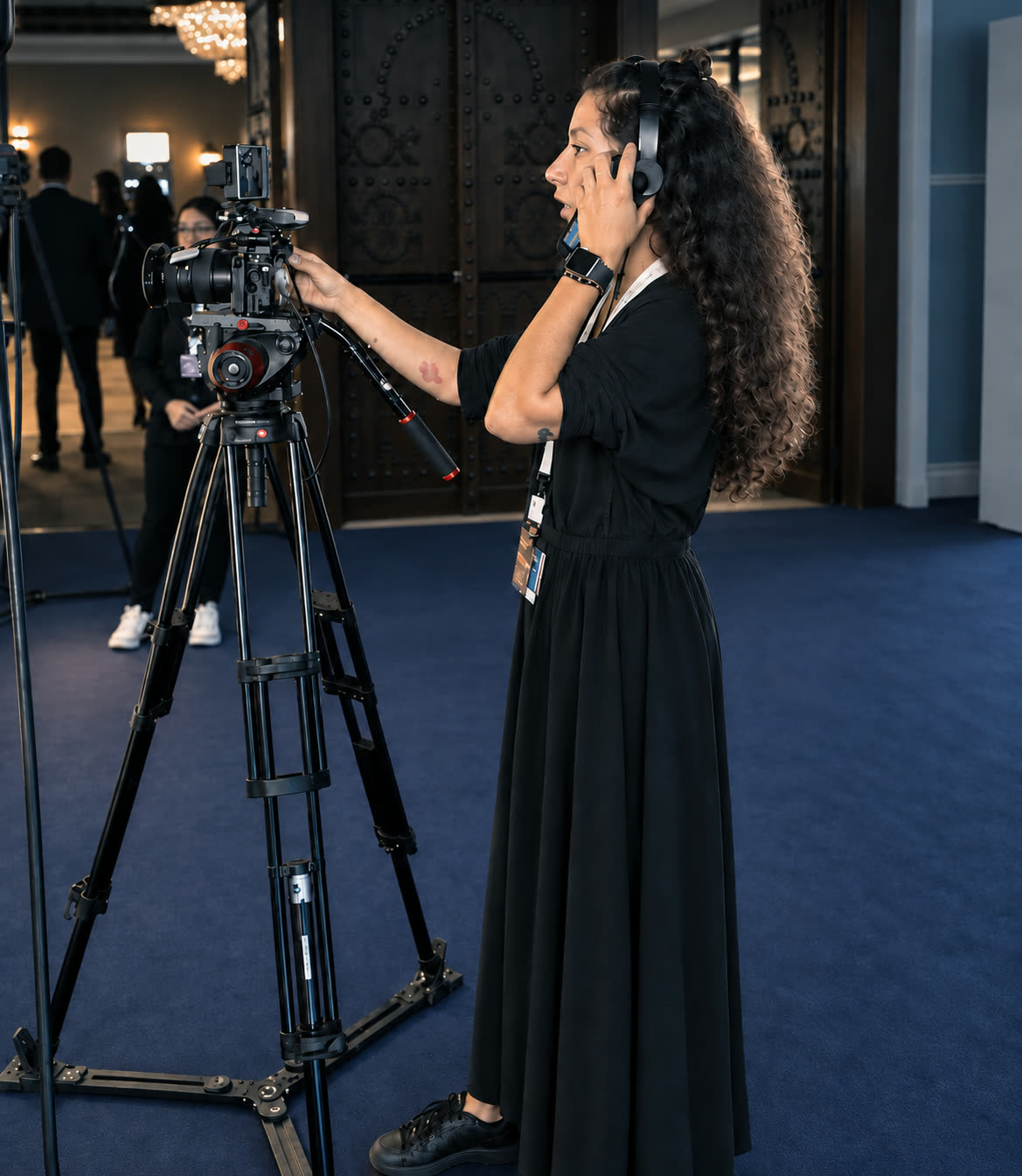 Sophia operating a production camera